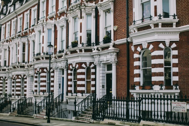 Row of classic Victorian townhouses in Hortons Street, London, showcasing architectural elegance.