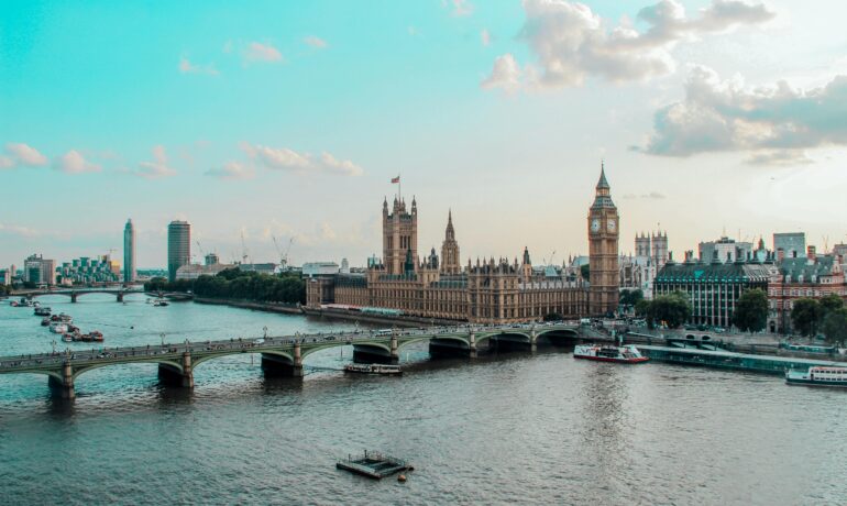 Captivating aerial view of Westminster Palace, Big Ben, and River Thames in London, UK.